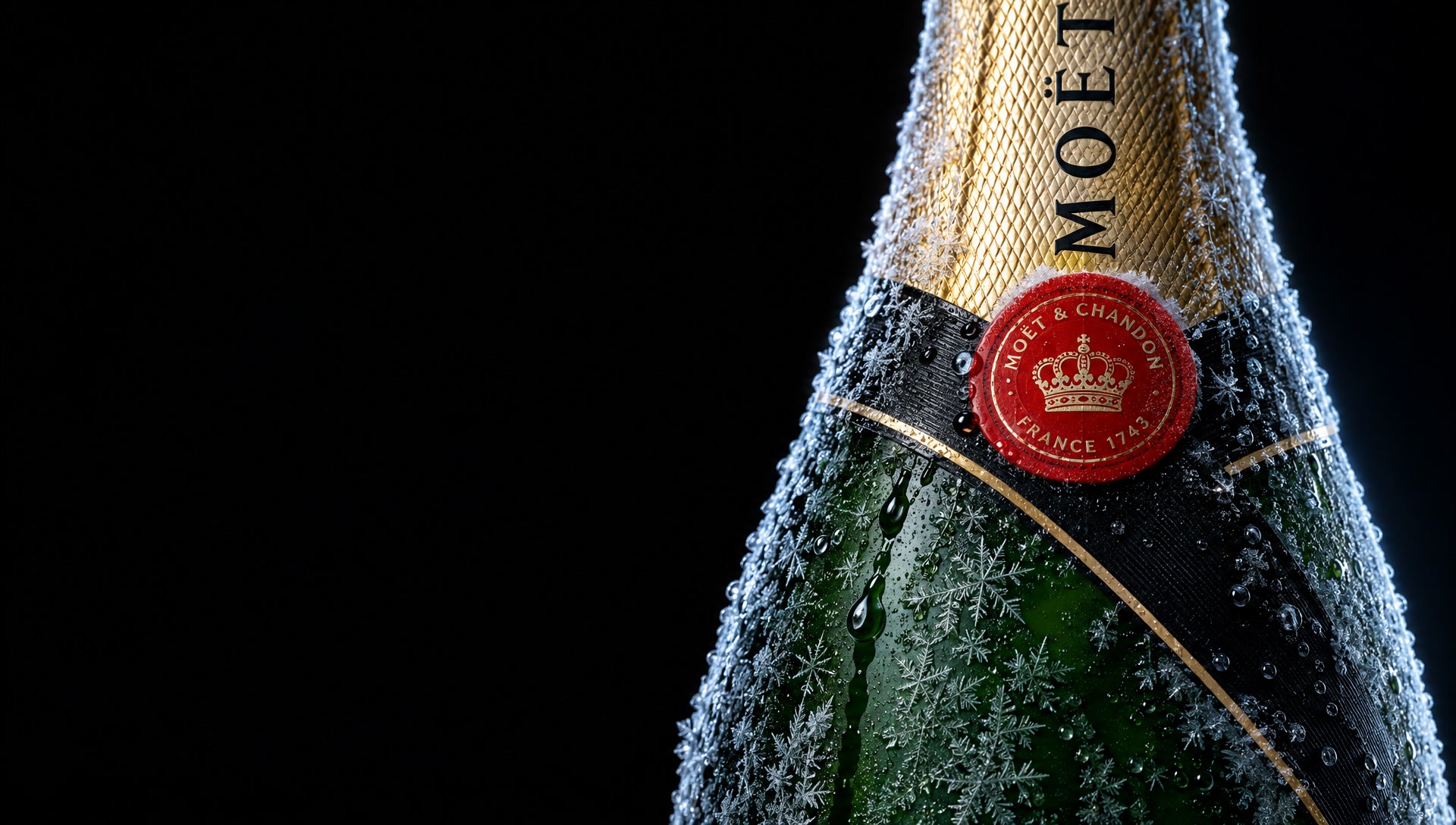 The same bottle chilled, frost across the glass